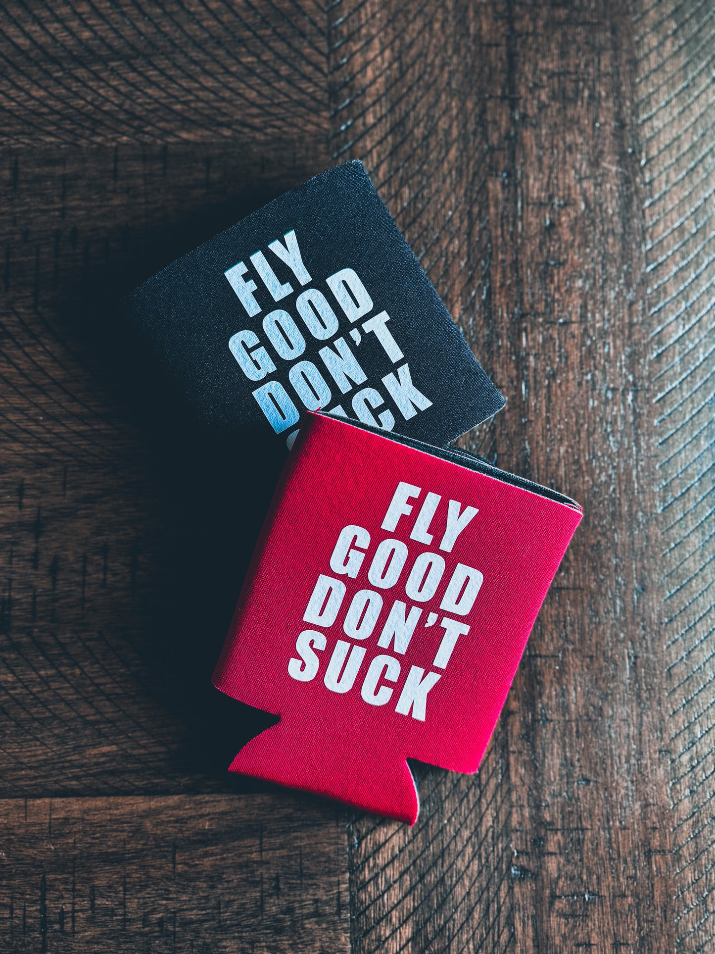 Black "Fly Good Don’t Suck" Koozie