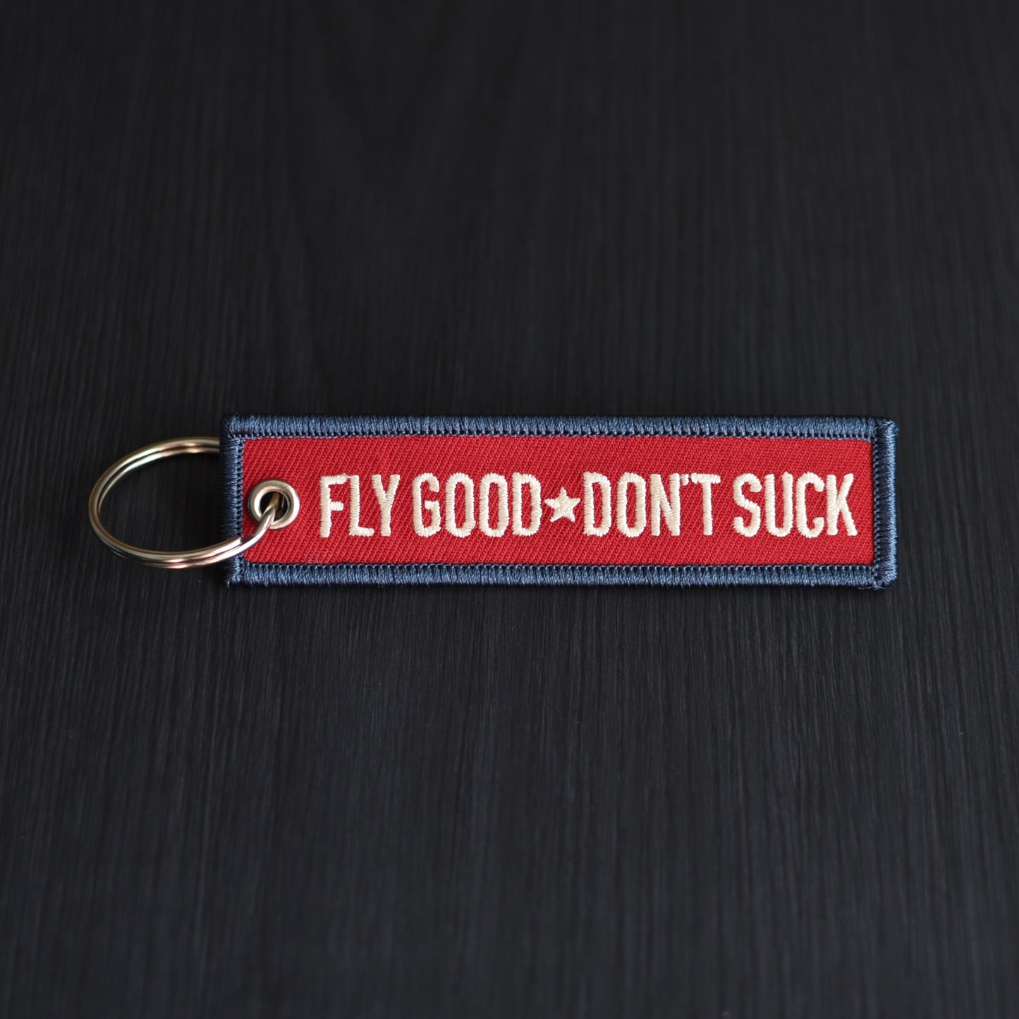 Patriotic Fly Good Don't Suck Keychain