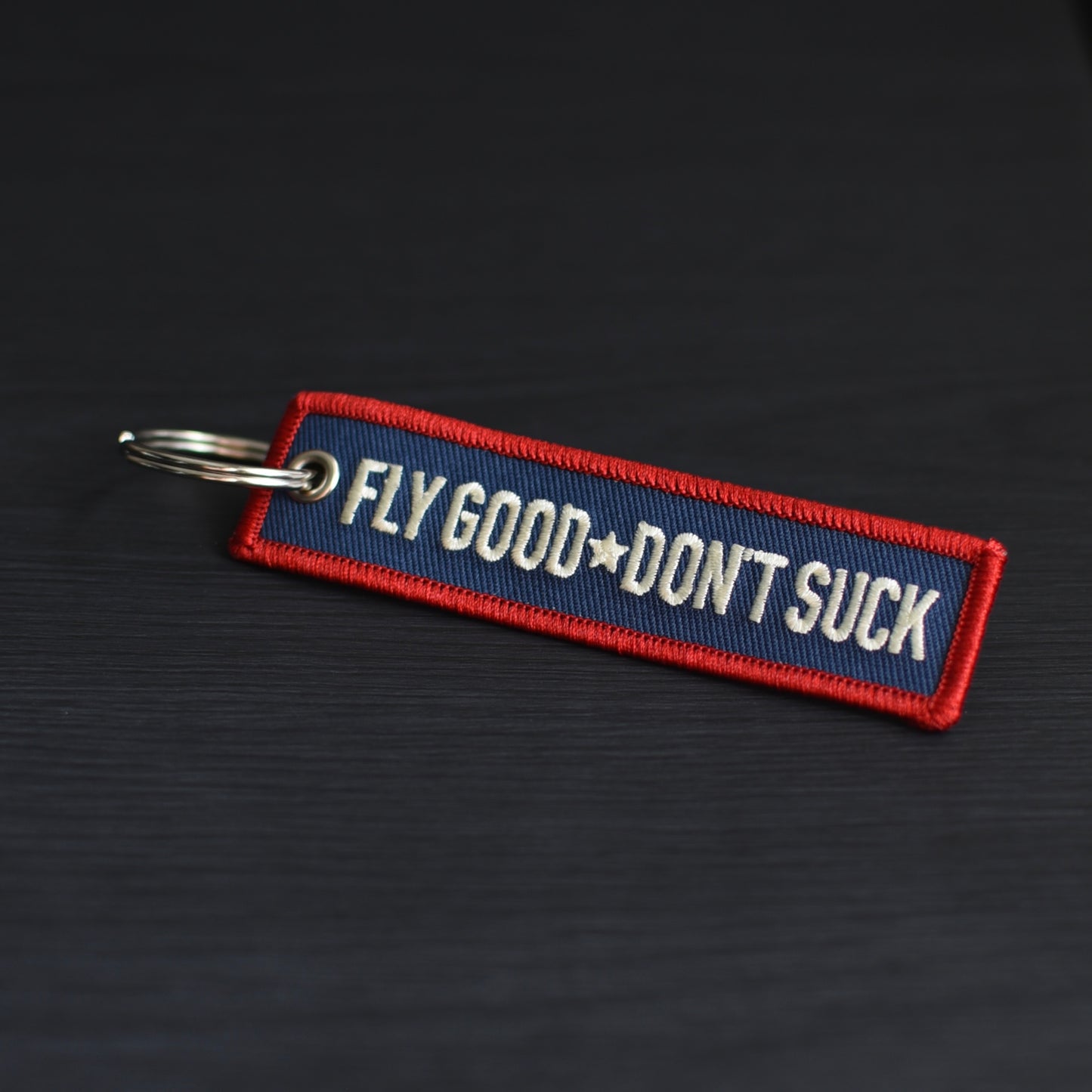 Patriotic Fly Good Don't Suck Keychain