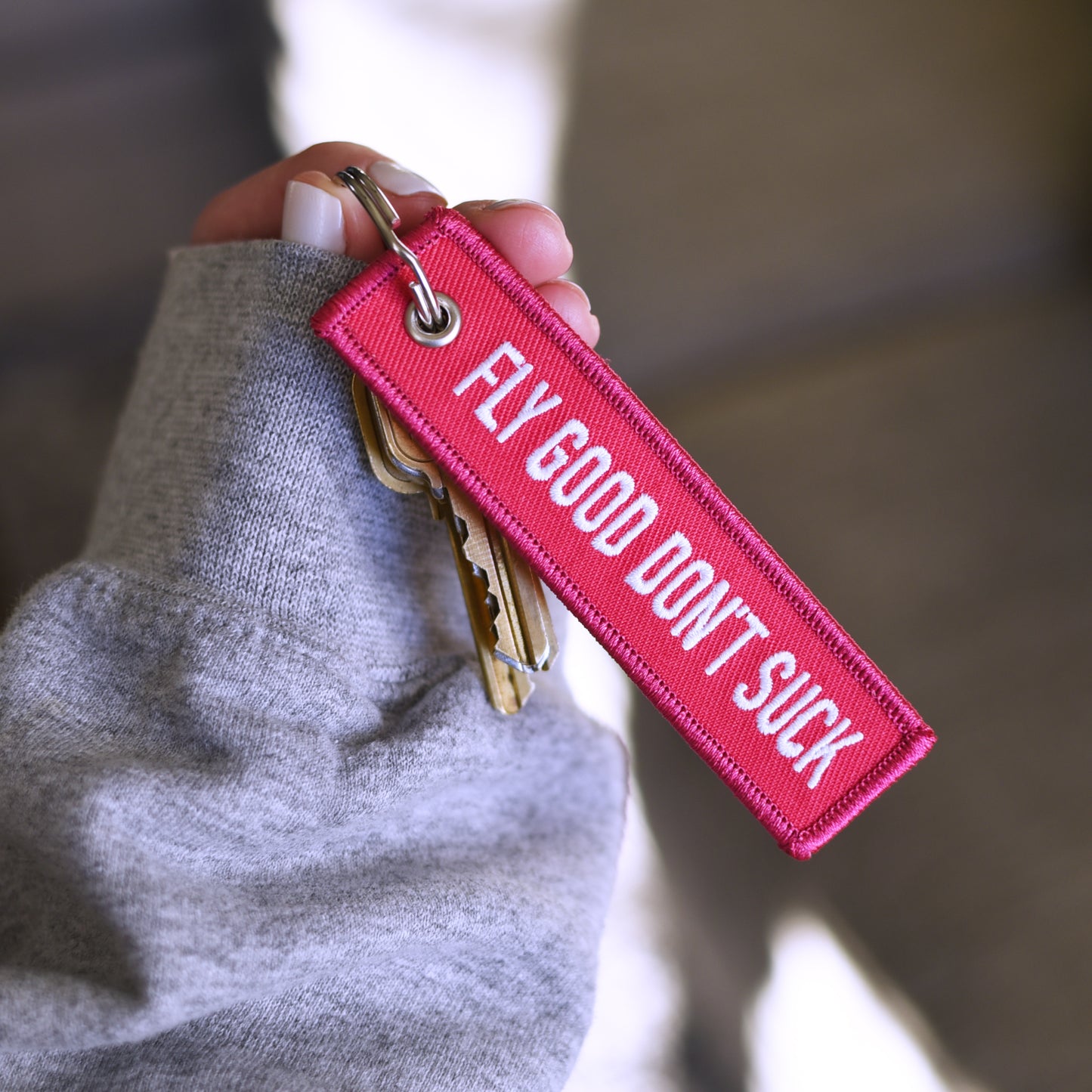 Pink Fly Good Don't Suck Keychain