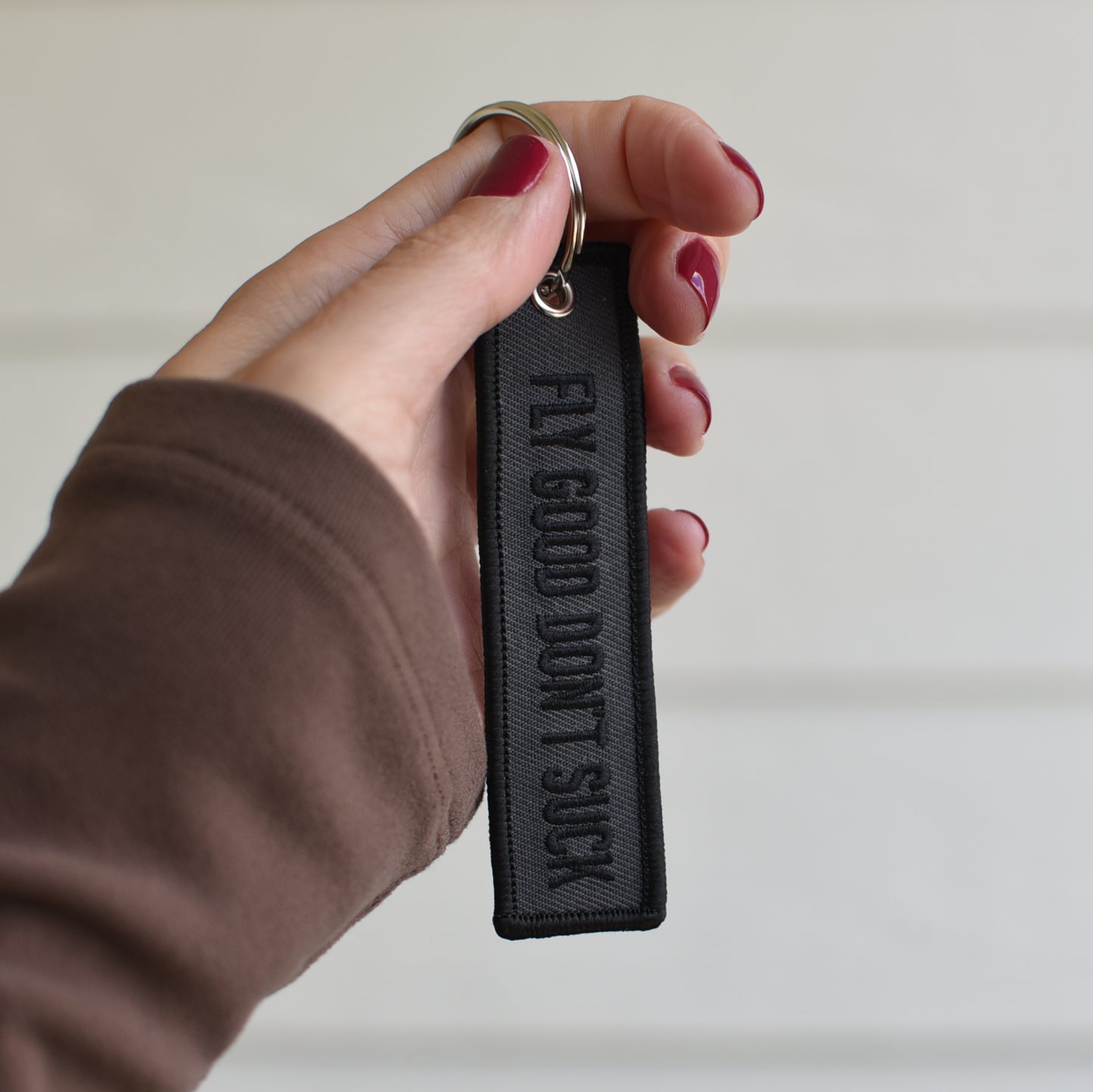 GRAPHITE FLY GOOD DON'T SUCK KEYCHAIN